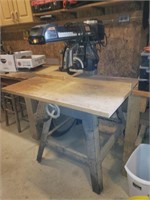 Craftsman 10" radial arm saw on stand.