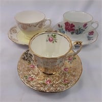 Set of three lovely tea cup and saucer pairings