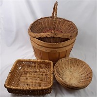 7 wicker baskets including two half bushels