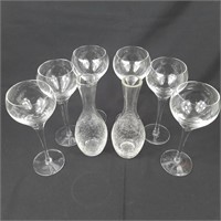 Crystal red wine glasses and crackle glass vases