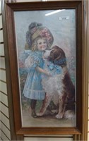 Framed picture of girl and dog