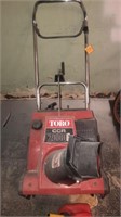 Toro CCR 2000 E snow blower with gas can