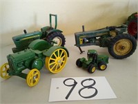 John Deere toy tractors lot of four as is flat