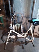 Hose reel, exercise bike and ankle weights