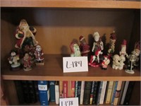Lot of Santas on Shelf