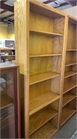 7 foot oak bookcase, with four adjustable