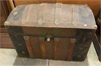 Antique hump top trunk, with pattern stamped