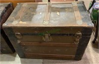 Antique flat top trunk, with the storage shelf