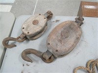 2 wood pulleys with metal wheels 8" and 6"