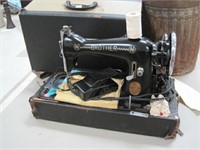 Brother sewing machine in case with foot switch.