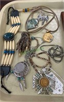 Collection of jewelry, including a buffalo nickel