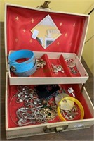 Small jewelry box with costume jewelry, mostly