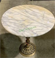 Round marble top side table, with a brass
