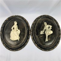 Pair of chalkware figurine cameo wall plaques
