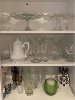 3 shelves full glassware