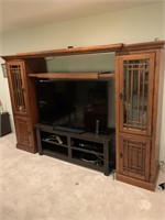 Black TV stand along with Oak Display