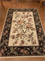 Approximately 8’x5’ area rug