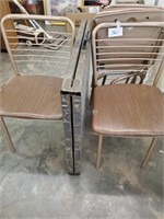 4 metal folding chairs and table