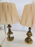 pair of brass lamps