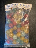 Vintage bag of cat eyes marbles