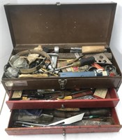 Tan toolbox with tools