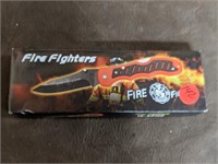 NIB Fire Fighter Folding Knife