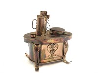 Animated Copper Cookstove Music Box