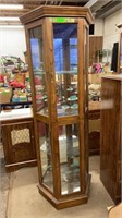 Wooden display case with glass shelves. Measures