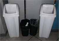 4 garbage cans -2sm, 2lg