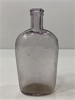 Vintage amethyst marked glass bottle