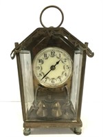 Brass and porcelain clock
