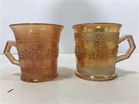 Two Fenton carnival glass mugs