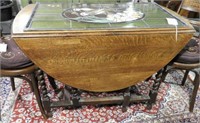 Lot #696 - Antique oak gateleg dining table
