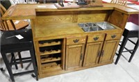 Lot #710 - Oak bar cabinet. Measures