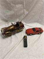 2 Cars. One Tin And Remote.