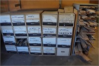 Cardboard files w/ contents & wood on shelf