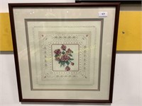 Framed, matted floral cross stitch