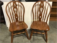 Pair of round back wooden dining chairs