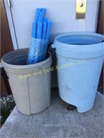 Two Rubbermaid Roughneck trash cans