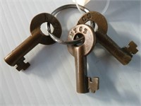 3 railroad keys marked NYCS