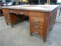 large double-sided wooden desk