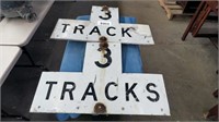 2 aluminum tracks signs