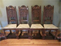 (4) ANTIQUE CARVED FEUDAL OAK DINING CHAIRS