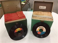 Two metal cases full of records