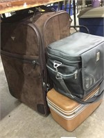 Three pieces of luggage not matching