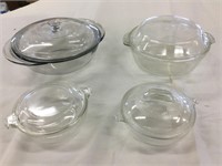 Three Pyrex and one anchor hocking baking dishes