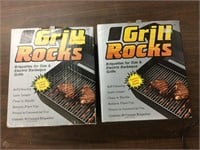 Two full boxes of grill rocks