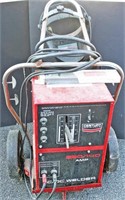 Century 230/140 Amp AC/DC Welder, Helmet, Rods