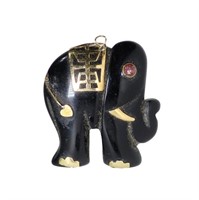 Hand carved black jade elephant pendant with