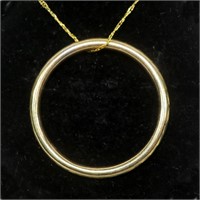 10K Yellow gold circle pendant on an 18" 10K gold
